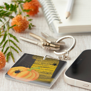 Spinnen en pompoen sleutelhanger