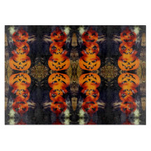 Spooky gestapelde Jack-O-Lanterns snijplank