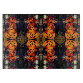 Spooky gestapelde Jack-O-Lanterns snijplank