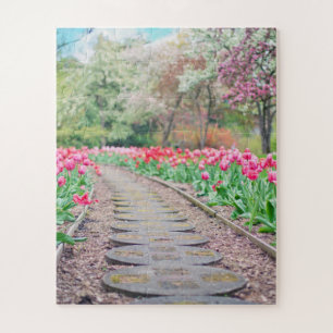 Springtime Flowers Along Stone Walkway Legpuzzel