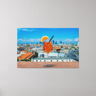 Spritz-cocktail op een tafel met uitzicht van Mila Canvas Afdruk