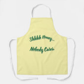 Ssst... Het kan niemand iets schelen. Schort (Voorkant)