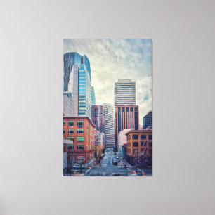 Stad bij zonsopgang canvas afdruk
