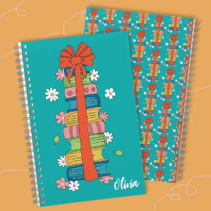 Stapel boeken met rode strik kind spiraal notebook