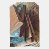 Stapel boeken op oude stoel theedoek (Verticaal)