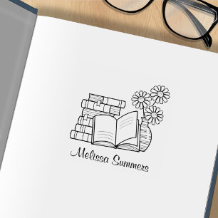 Stapel boeken, open boek, blokbord 	rubberstempel