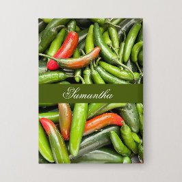 Stapel van groene pittige paprika's button