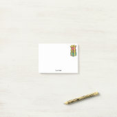 Stapelde gevlekte kerstcadeautjes post-it® notes (Op bureau)