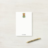 Stapelde gevlekte kerstcadeautjes post-it® notes (Op bureau)
