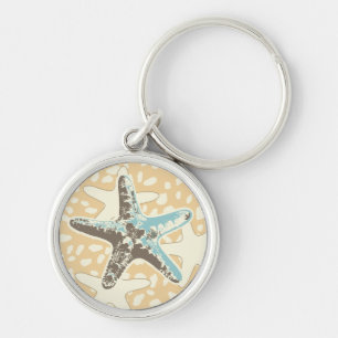 Starfish in de zand sleutelhanger