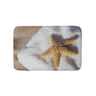 Starfish op een handdoek badmat