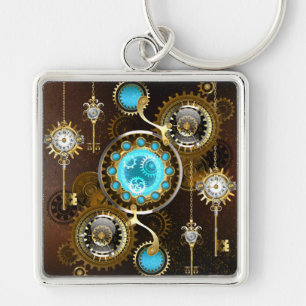 Steampunk roestige achtergrond met turkooizen lenz sleutelhanger
