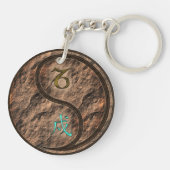 Steenbok & Aarde Hond Sleutelhanger (Achterkant)