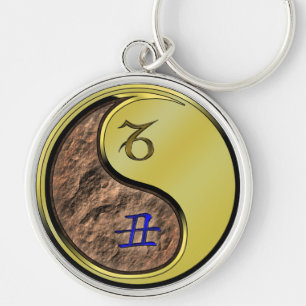 Steenbok en metalen os sleutelhanger