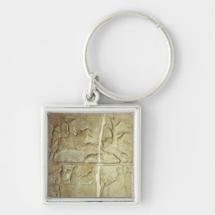 Stela relief die een jacht op wilde zwijnen weerge sleutelhanger