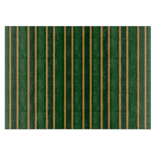 Stenen van snoep van Springbok, groen en goud Snijplank