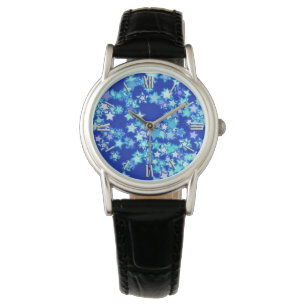 sterren, schoppen van bleek blauw tegen donkerblau horloge