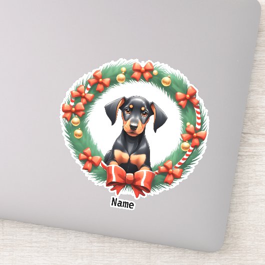Sticker Adorable Coupe Doberman de Noël dans une couronne (Détail)