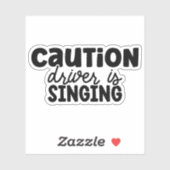 Sticker Attention le conducteur chante (Feuille)