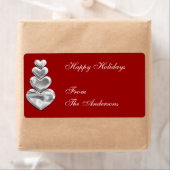 Sticker cadeau étiquette Coeurs d'argent sur rouge (En situation)