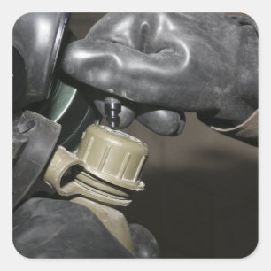 Sticker Carré A Marine insère un tube à boire dans sa cante