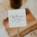 Sticker Carré Accueil Mariage de calligraphie noire délicate<br><div class="desc">Ces délicats stickers de mariage de calligraphie noire sont parfaits pour un mariage moderne. Le design minimaliste romantique présente une belle et élégante typographie noire sur un arrière - plan blanc au look épuré et sobre. Personnalisez ces autocollants avec l'emplacement de votre mariage, vos noms et votre date de mariage....</div>