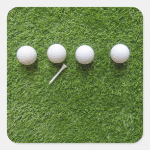 Sticker Carré Balles de golf avec tee sur gazon vert