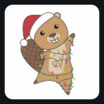 Sticker Carré Beaver Cheerful<br><div class="desc">The beaver at Christmas with fairy lights. Funny animals with toxits and snow for the holidays. Donc Funny for Christmas in July. Beavers are cute animals and perfect for Christmas.</div>