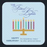 Sticker Carré Bleu clair coloré Menorah Hanoukka<br><div class="desc">Voici un look graphique amusant pour un autocollant Hanoukka. Une menorah colorée met en évidence un panneau bleu pâle rayé avec un "Festival des lumières" orné dans un traitement typographique ci-dessus. Un message customisé spécial se trouve en dessous. Idéal pour les enveloppes ou pour coller sur des forfaits de vacances...</div>