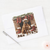 Sticker Carré Boxer au chapeau de Père Noël près de la cheminée  (Enveloppe)