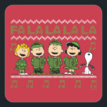 Sticker Carré Caroling Christmas Sweater Graphic<br><div class="desc">Découvrez Sally,  Linus,  Charlie Brown,  Lucy,  and Snoopy en train de chanter dans ce graphique de style "Christmas Sweater".</div>