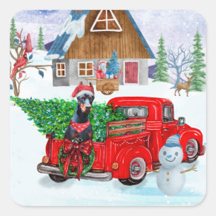 Sticker Carré Chien Doberman dans un camion de livraison de Noël