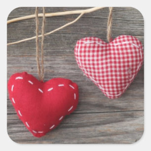 Sticker Carré Coeurs rouges sur le Tableau en bois