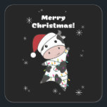 Sticker Carré Cow Cheerful<br><div class="desc">The cow at Christmas with fairy lights. Funny animals with toxits and snow for the holidays. Donc Funny for Christmas in July. Cows are cute animals et perfect pour Christmas.</div>