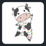 Sticker Carré Cow Cheerful Christmas Winter Animals<br><div class="desc">The cow at Christmas with fairy lights. Funny animals with toxits and snow for the holidays. Donc Funny for Christmas in July. Cows are cute animals et perfect pour Christmas.</div>
