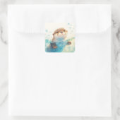 Sticker Carré Cute Baby Otter Splashing in Sparkling Blue Water (Sac)