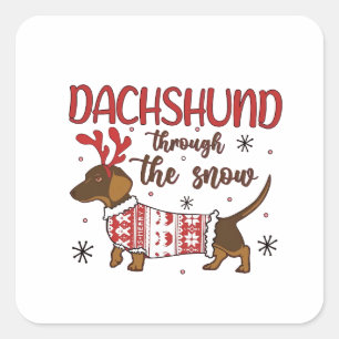 Sticker Carré Dachshund à travers la neige Noël Amateur de chien