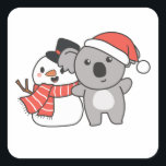 Sticker Carré Koala With Snowman<br><div class="desc">Koala with snowman en hiver pour Christmas - a snowman for winter and Christmas. A winter greeting in the cold season for the holidays. Christmas koala with snowman.</div>