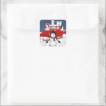 Sticker Carré Laisser neiger<br><div class="desc">This design feobjets the nostalgia of a vintage red truck with some Arctic animals and a snowman in a wintry scene.</div>