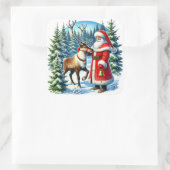 Sticker Carré Le Père Noël et le renne dans une forêt de neige (Sac)