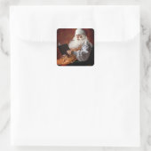 Sticker Carré Le Père Noël lit le livre (Sac)