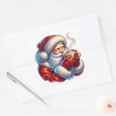 Sticker Carré Le Père Noël savoure une boisson chaude pendant un (Enveloppe)