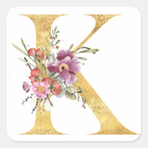 Lettre K monogramme dorée avec fleurs