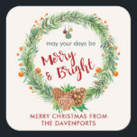 Sticker Carré Merry & Bright Christmas Wreath<br><div class="desc">Un autocollant de Noël personnalisé avec une couronne d'aquarelle. Seringues de pin vert,  cônes de pin et baies décoratives composent cette couronne festive. À l'intérieur de la couronne sont quelques ornements décoratifs et les mots" mai vos jours être Joyeux et lumineux. Écrit dans une police rouge tendance.</div>