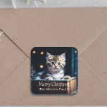 Sticker Carré Message de Noël personnalisé Christmas Kitten<br><div class="desc">stickers de Noël avec un adorable petit chaton rayé gris assis dans une boîte avec des lumières de Noël dans l'arrière - plan.</div>