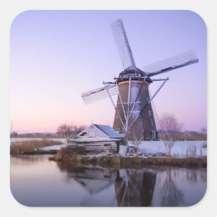 Sticker Carré Moulin à vent pendant le lever de soleil dans