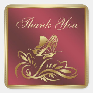 Sticker Carré Papillon doré et tourbillons sur Merci rouge foncé