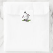 Sticker Carré Penguin en Snowboardeur avec Snowboard (Sac)
