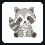 Sticker Carré Raccoon<br><div class="desc">Les Racon to softness with fairy lights. Funny animals with toxits and snow to the holidays. Donc Funny for Christmas in July. Raccoons are sweet animals and perfect for Christmas.</div>
