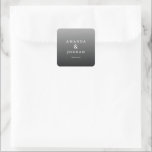 Sticker Carré Reconnaissance Grise Élégante<br><div class="desc">Cet autocollant de mariage présente un design minimaliste avec un fond gris dégradé, passant du clair au foncé. La mise en page est épurée et équilibrée, mettant en valeur deux prénoms dans une typographie sérif élégante reliés par une esperluette, suivis d'un simple "merci" dans une police sans-serif contrastée. La palette...</div>